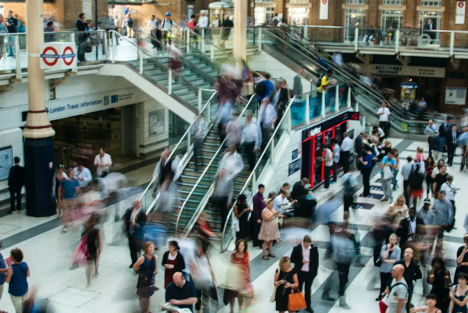 Pedestrians in a busy London station