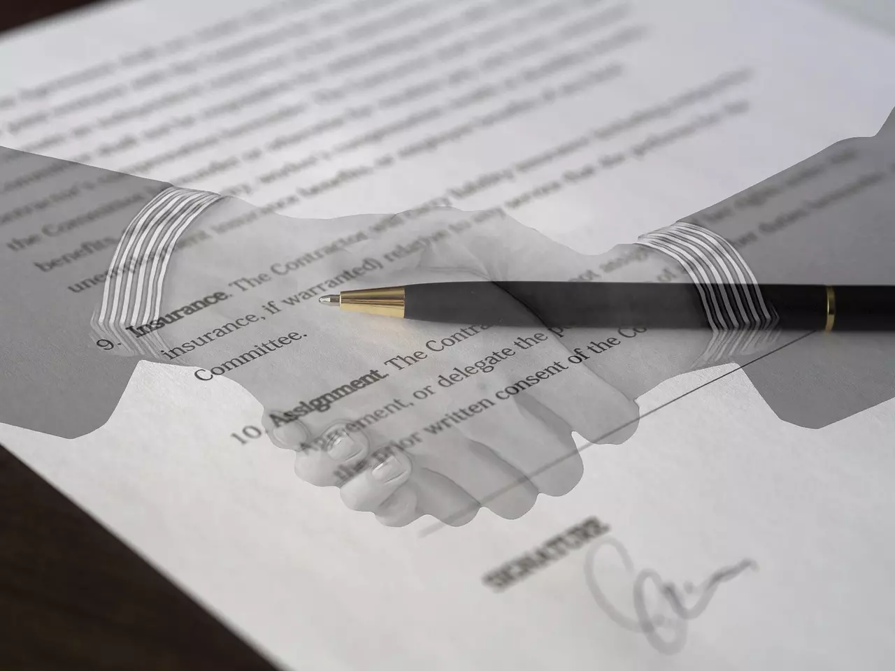 A pen lying on a legal document