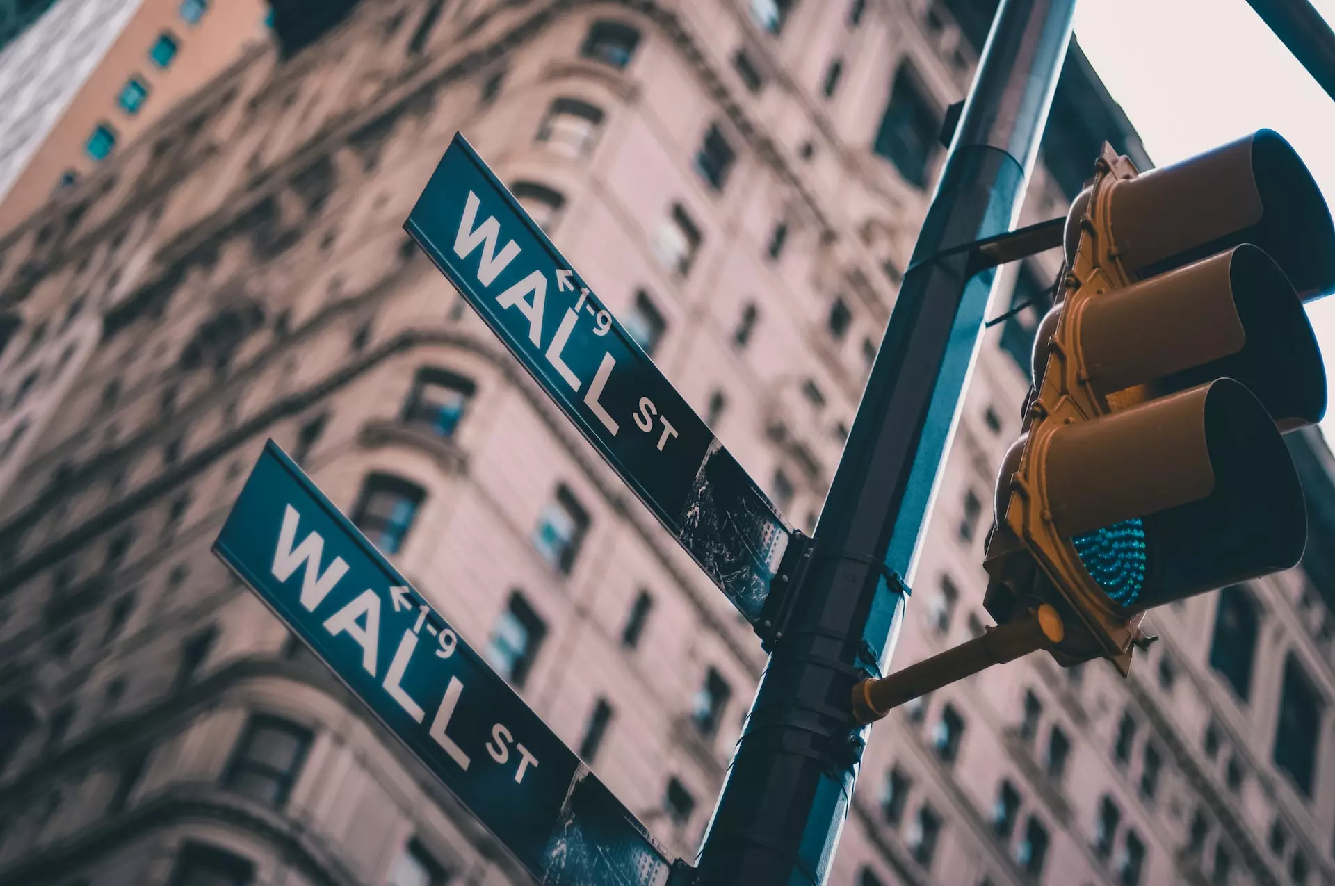 Wall Street street sign and traffic light