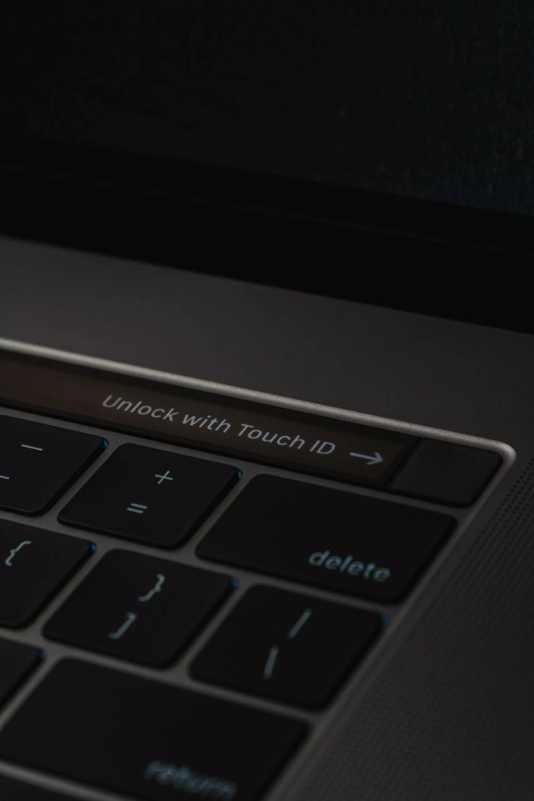 The unlock button on a Mac keyboard