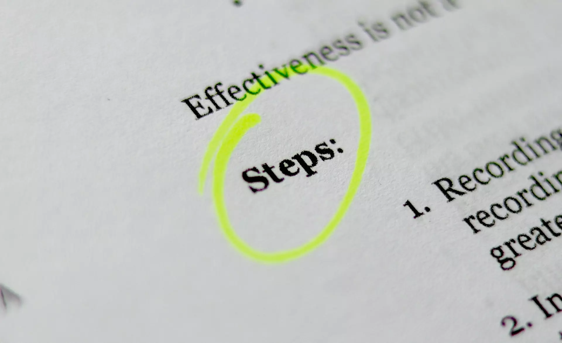 A piece of paper with the word 'Steps' highlighted